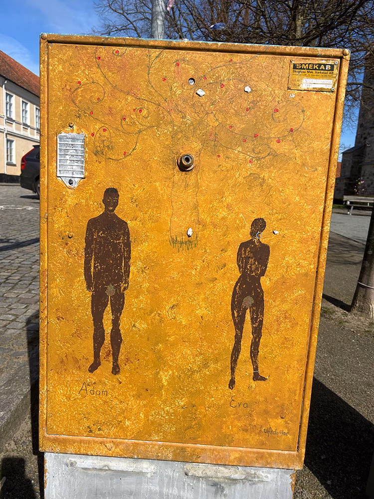 Målning på elskåp "man" och "kvinna"